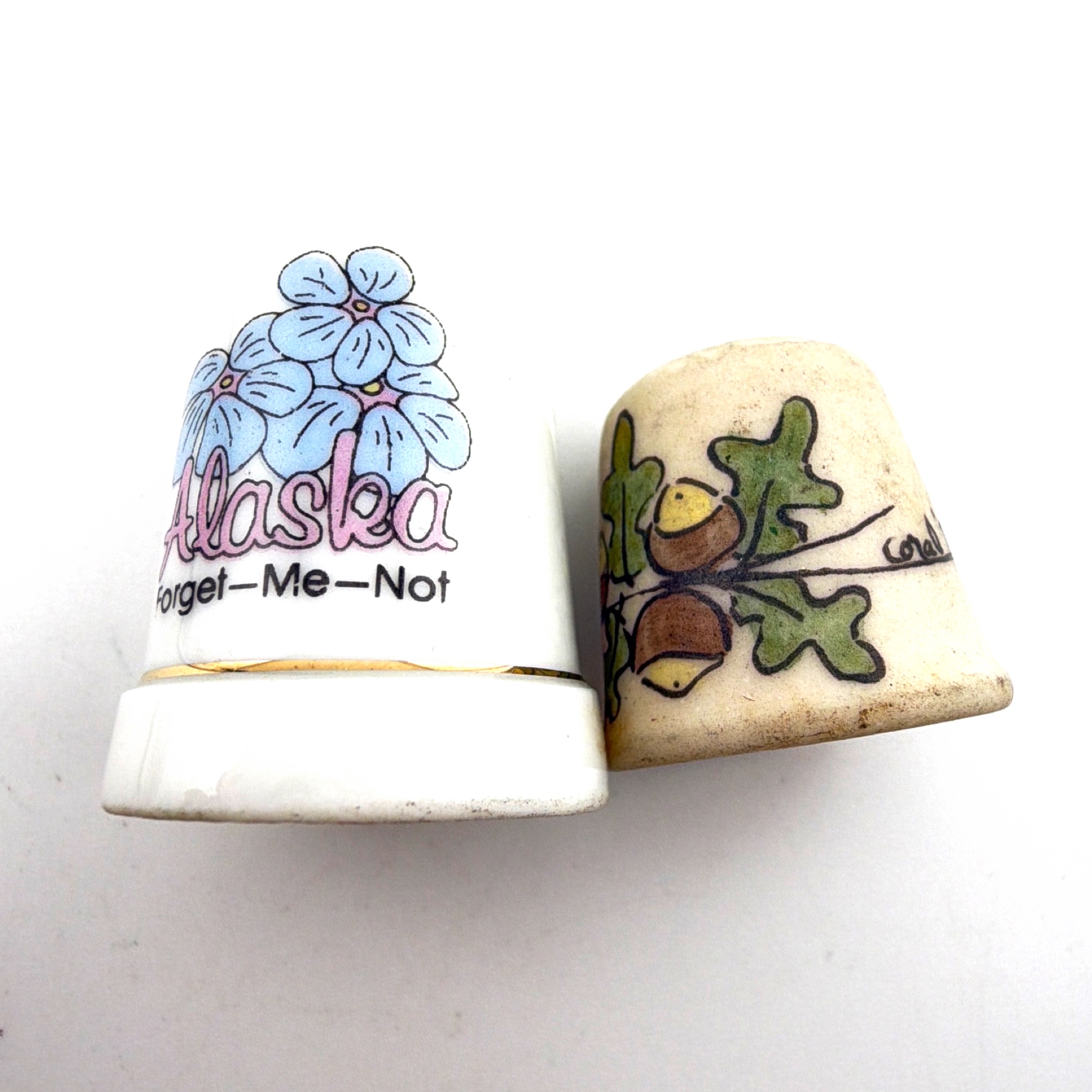 70s 1.125 in Coral Acorn Ceramic and Alaska Forget-Me-Not Porcelain Sewing Thimbles Lot 13.47g