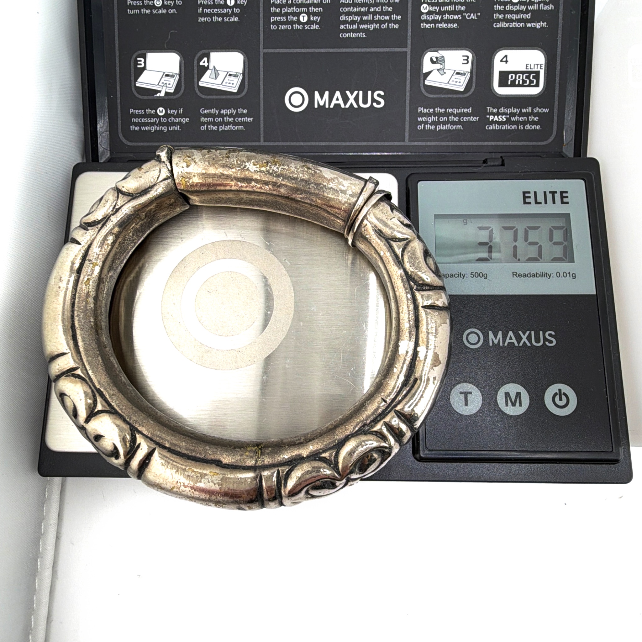 Silver Tone Scroll Motif Hinged Bangle Bracelet 37.59g 2.5 in — For scale