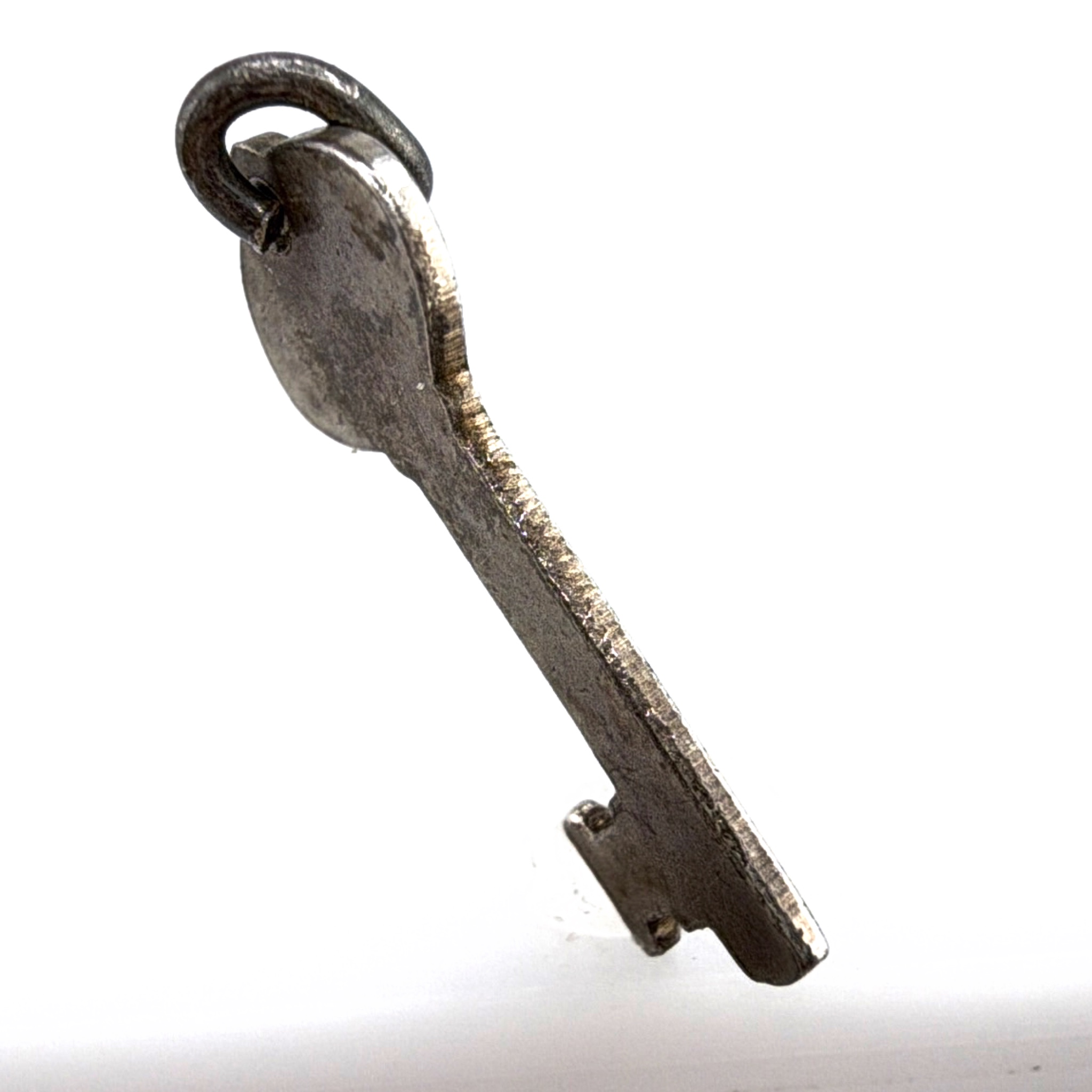 Vintage Sterling Tiny Key Charm 0.81g — Back