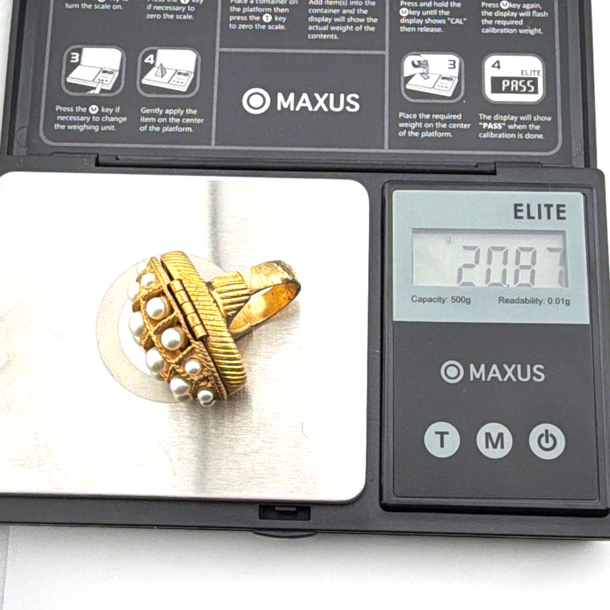70s Size 5 Avon Gold Tone Faux Pearl Hinged Compartment Ring 20.87g — For scale