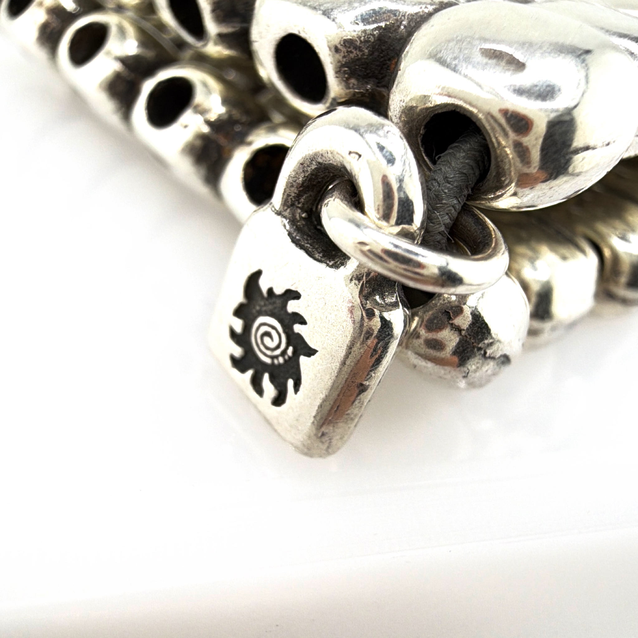 Uno de 50 Silver Tone Wide Stretch Cuff Bracelet, 170.18g 7-7.50in — Detail