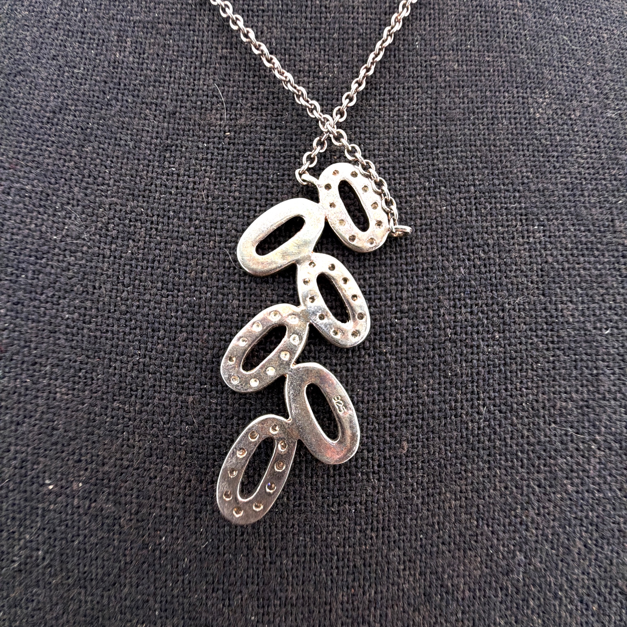 Contemporary Sterling Silver Two-Tone Pave Cascading Oval Pendant Necklace — Side