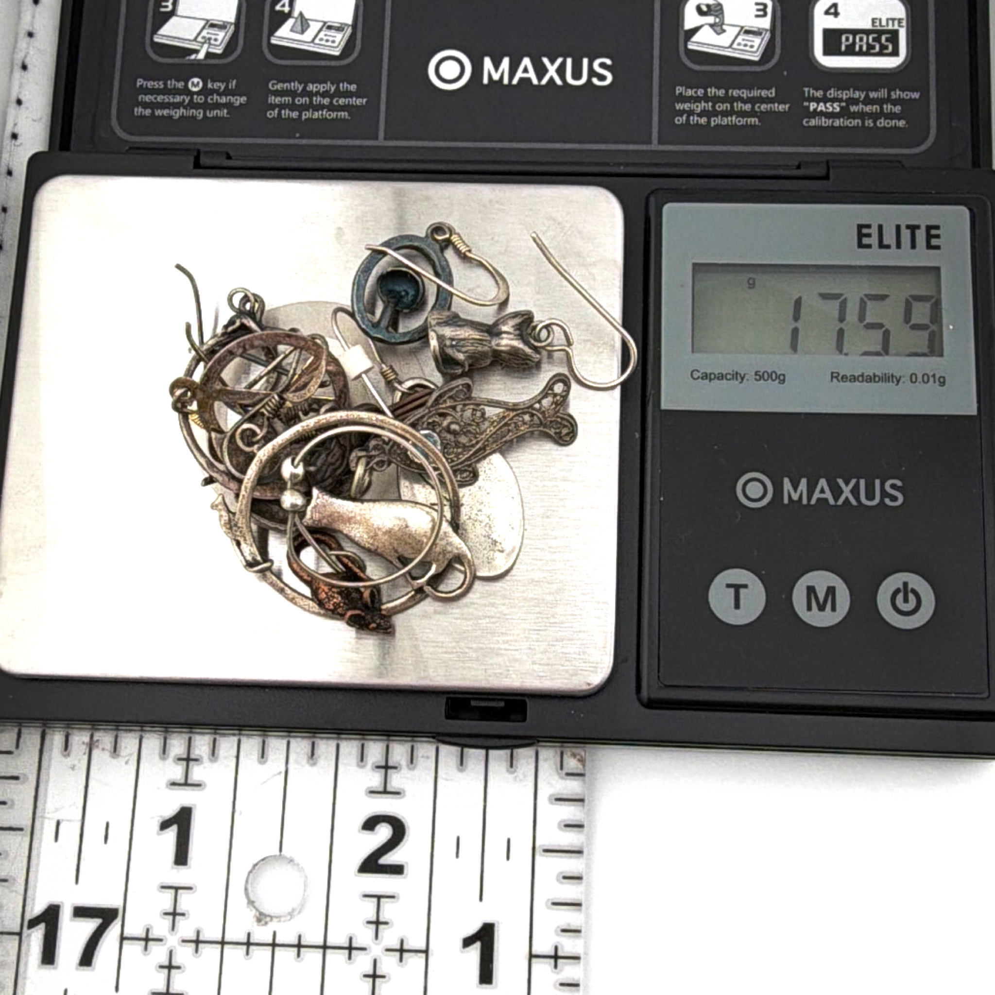 Silver Tone Novelty Charm & Single Earring Lot, Cats Peace Fish 17.59g — For scale