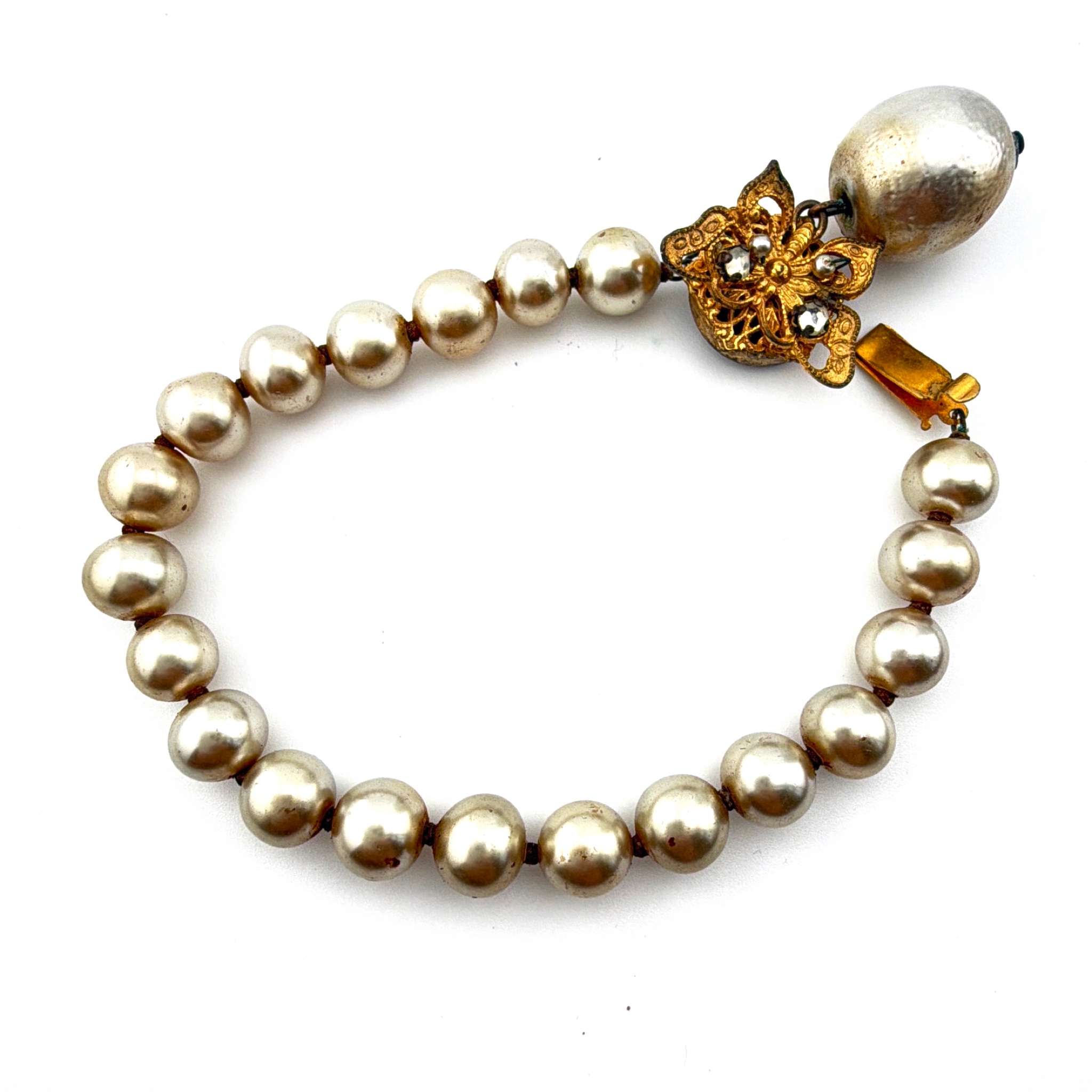 Mid-Century 50s–60s 7 in Miriam Haskell Gold Tone Faux Pearl Rhinestone Butterfly Filigree Dangle Bracelet 26.42g — Front