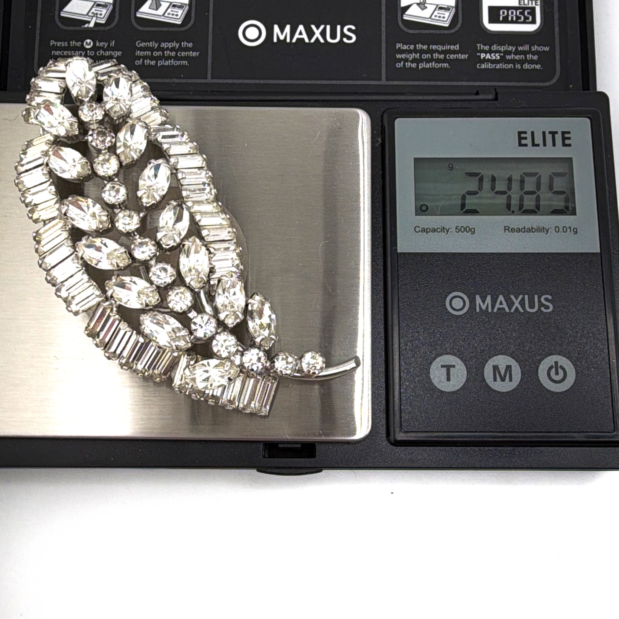 Vintage Weiss Silver Tone Rhinestone Leaf Brooch, Baguette Trim 24.85g — For scale