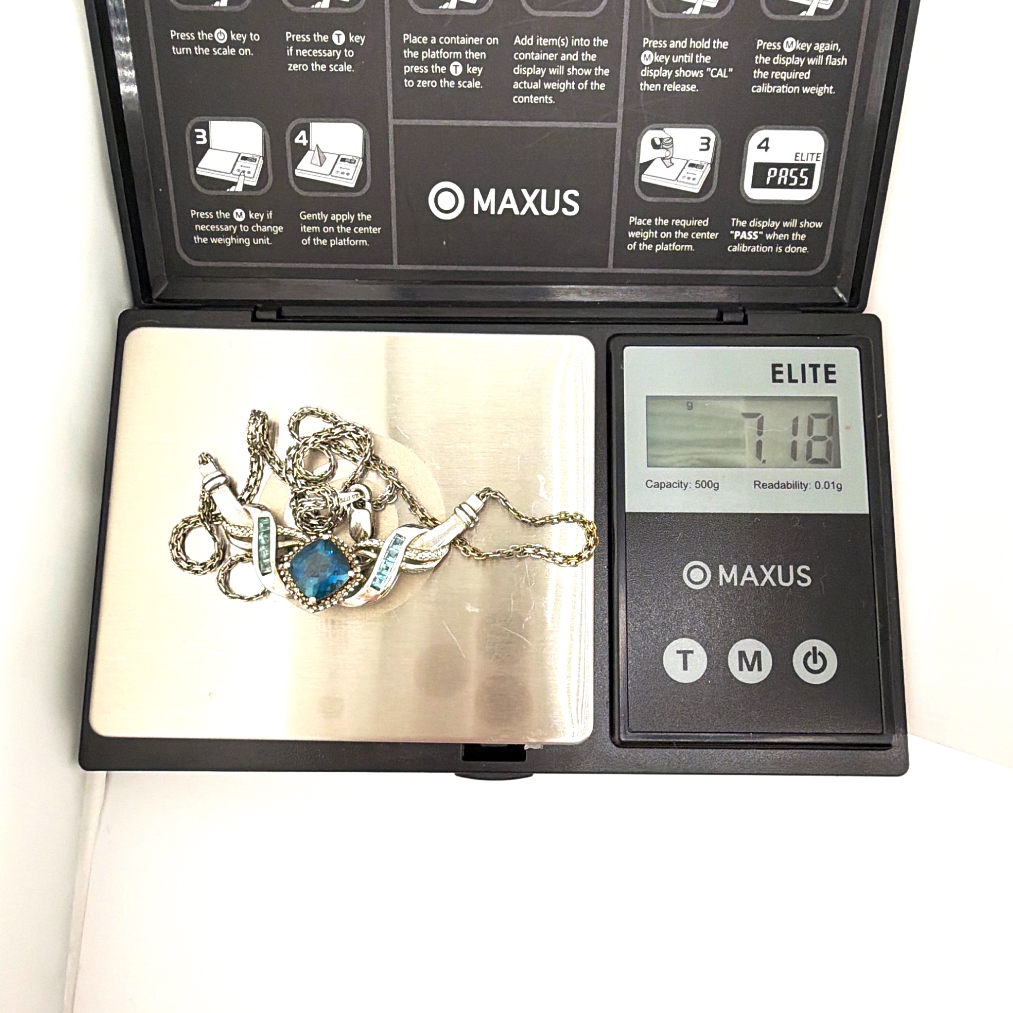 Sterling Silver Blue Topaz Swirl Pendant Necklace, Signed SUN 7.18g 20.5in — For scale