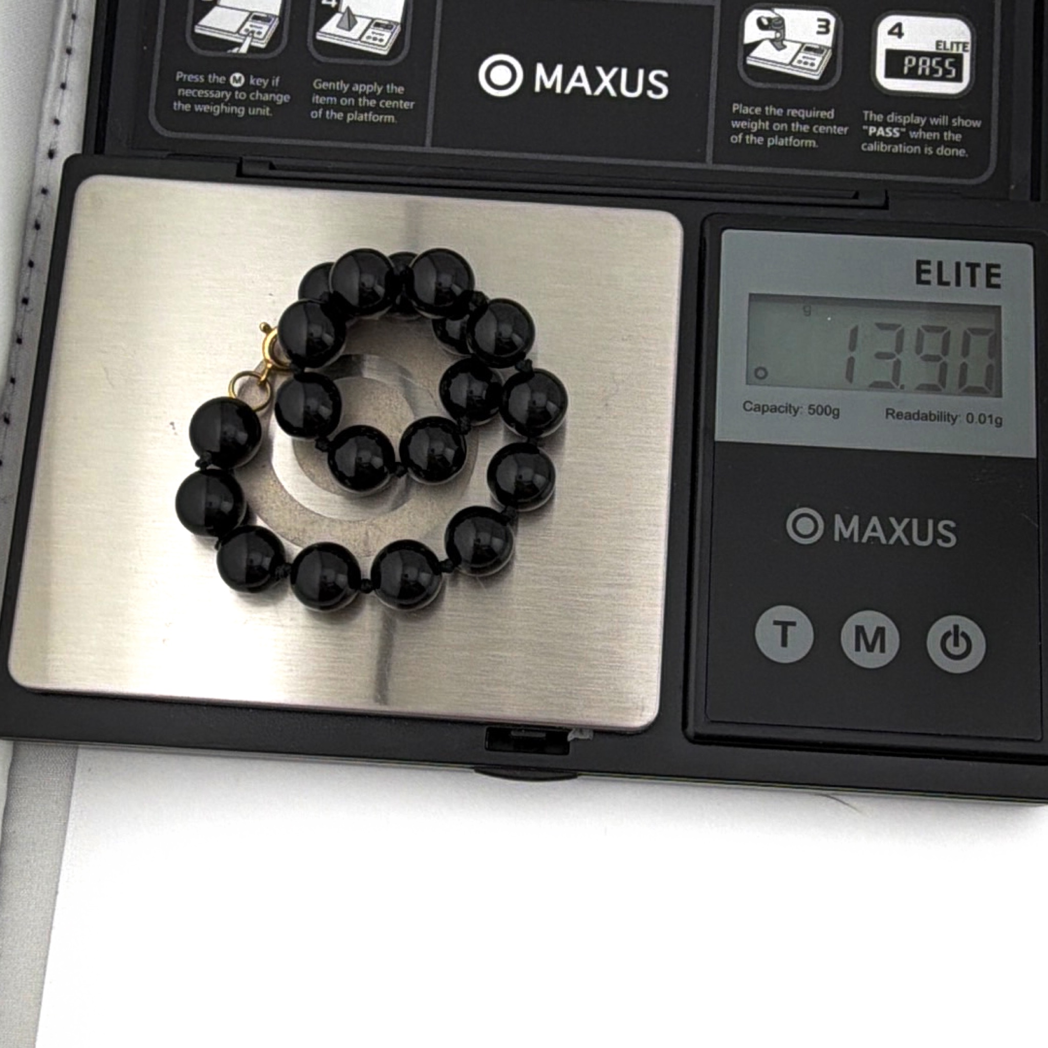 Gold tone Onyx Bead Bracelet 13.90g 7 in — For scale