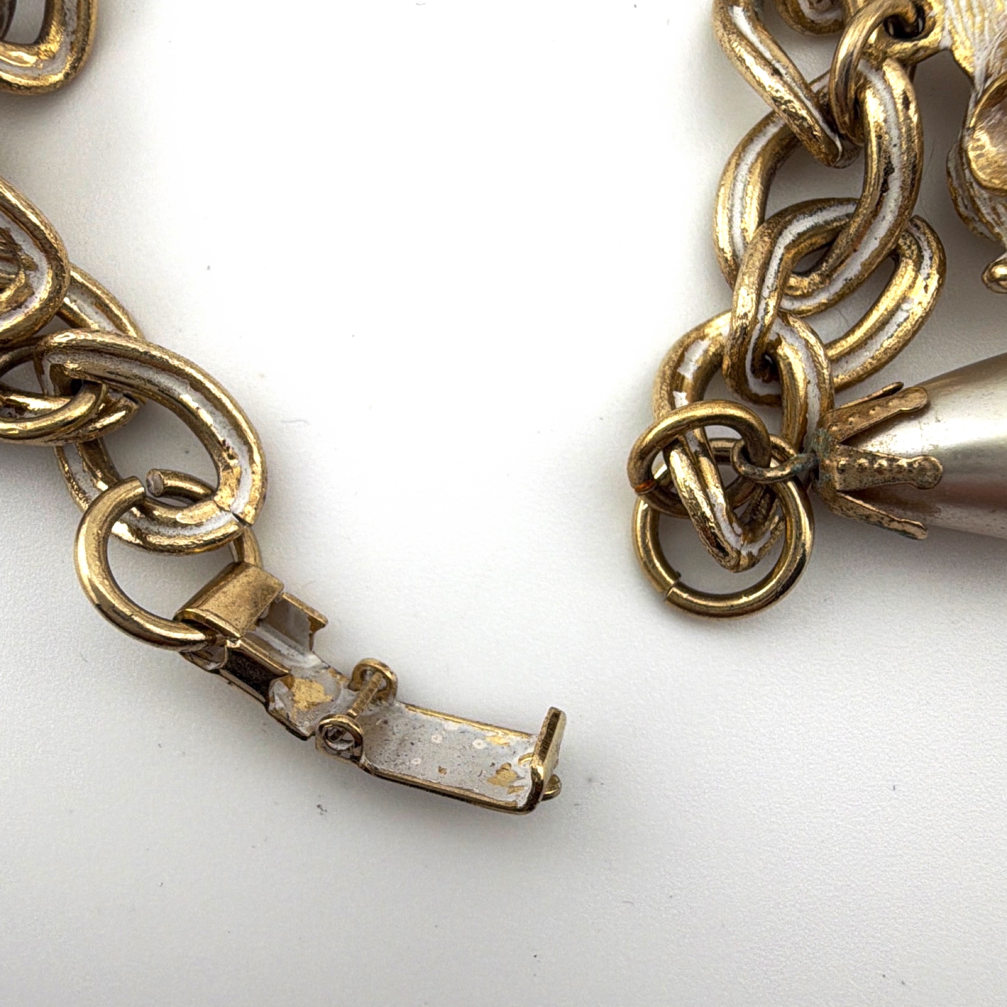 Mid-Century 50s–60s 7.5 in Gold Tone Blue AB Rhinestone Faux Pearl Figural Fish Charm Bracelet 63.38g — Front