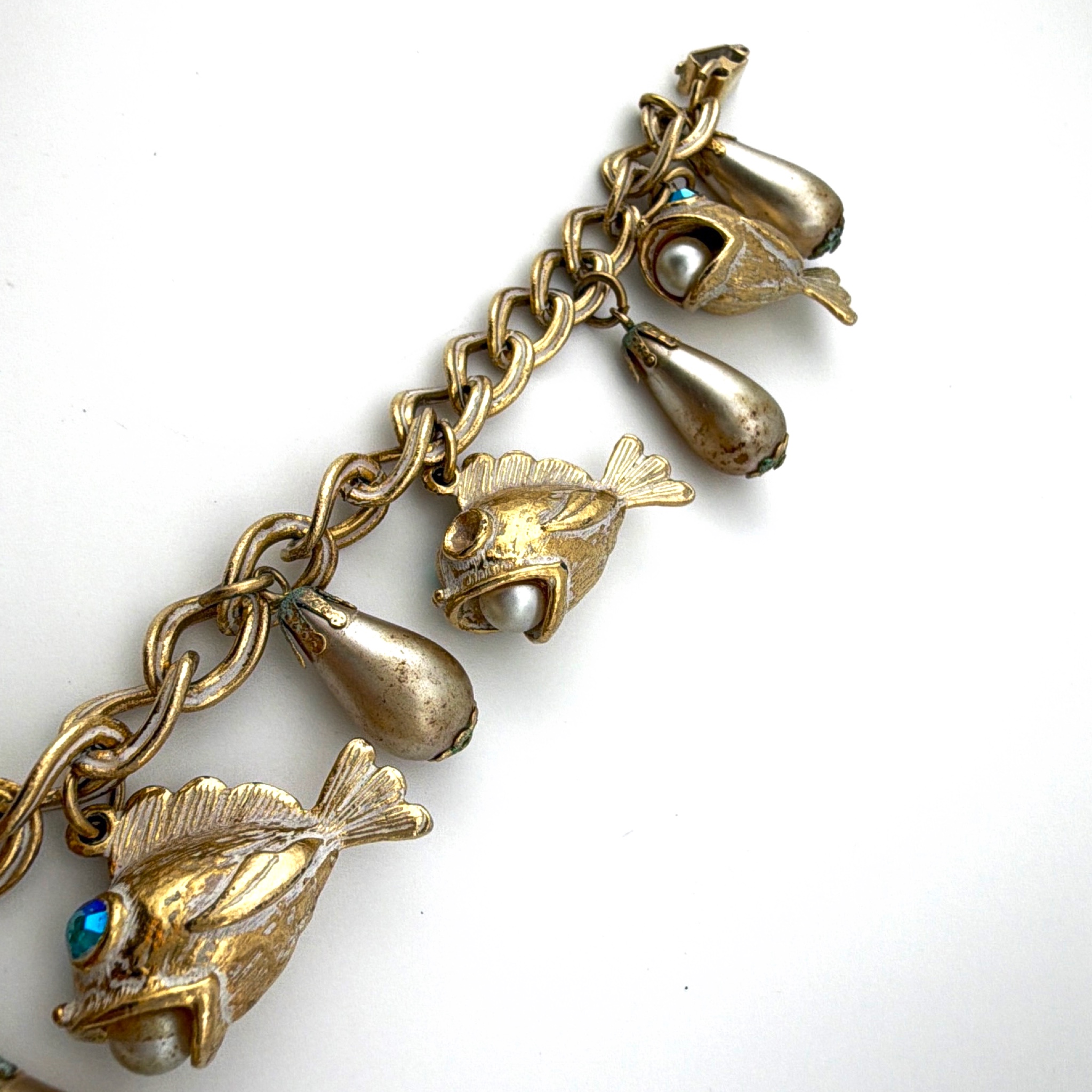 Mid-Century 50s–60s 7.5 in Gold Tone Blue AB Rhinestone Faux Pearl Figural Fish Charm Bracelet 63.38g — Front
