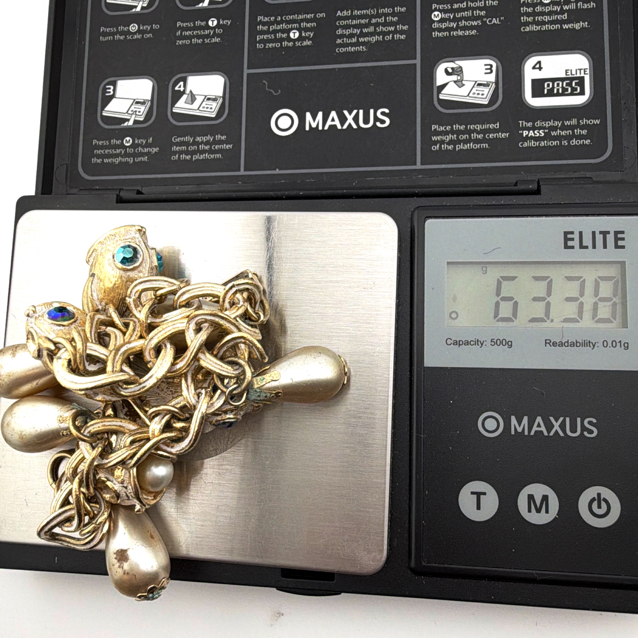 Mid-Century 50s–60s 7.5 in Gold Tone Blue AB Rhinestone Faux Pearl Figural Fish Charm Bracelet 63.38g — For scale