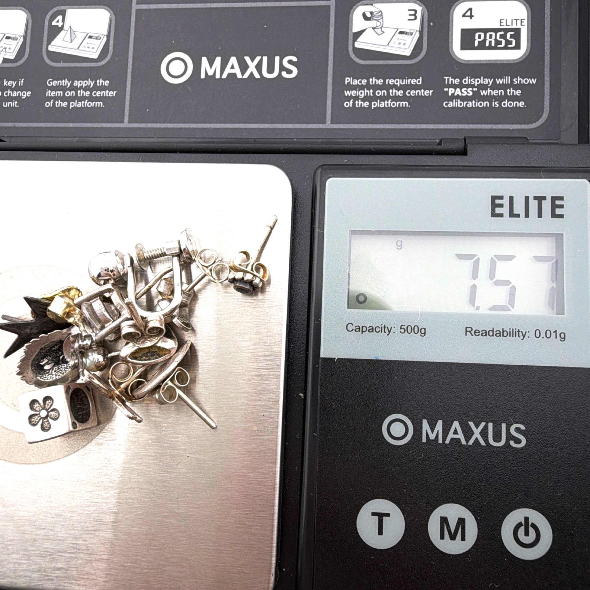 Mixed Tone Assorted Figural Single Earrings and Charm Bead Lot 7.57g — For scale