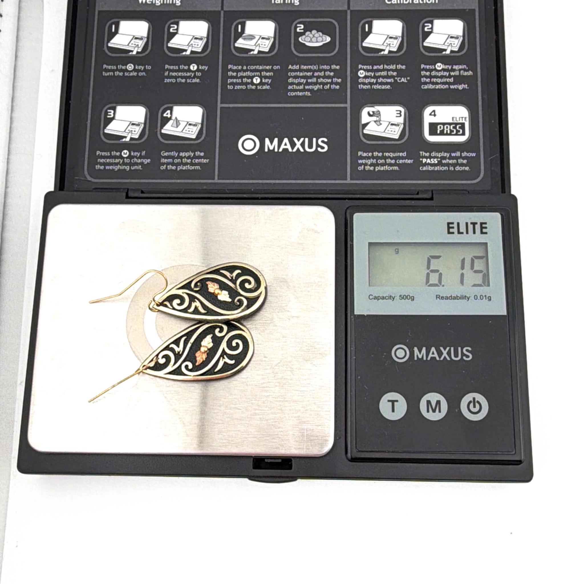 Coleman Co. Gold Tone Black Leather Tri-Color 1.625 in Leaf Scroll Teardrop Dangle Earrings — For scale