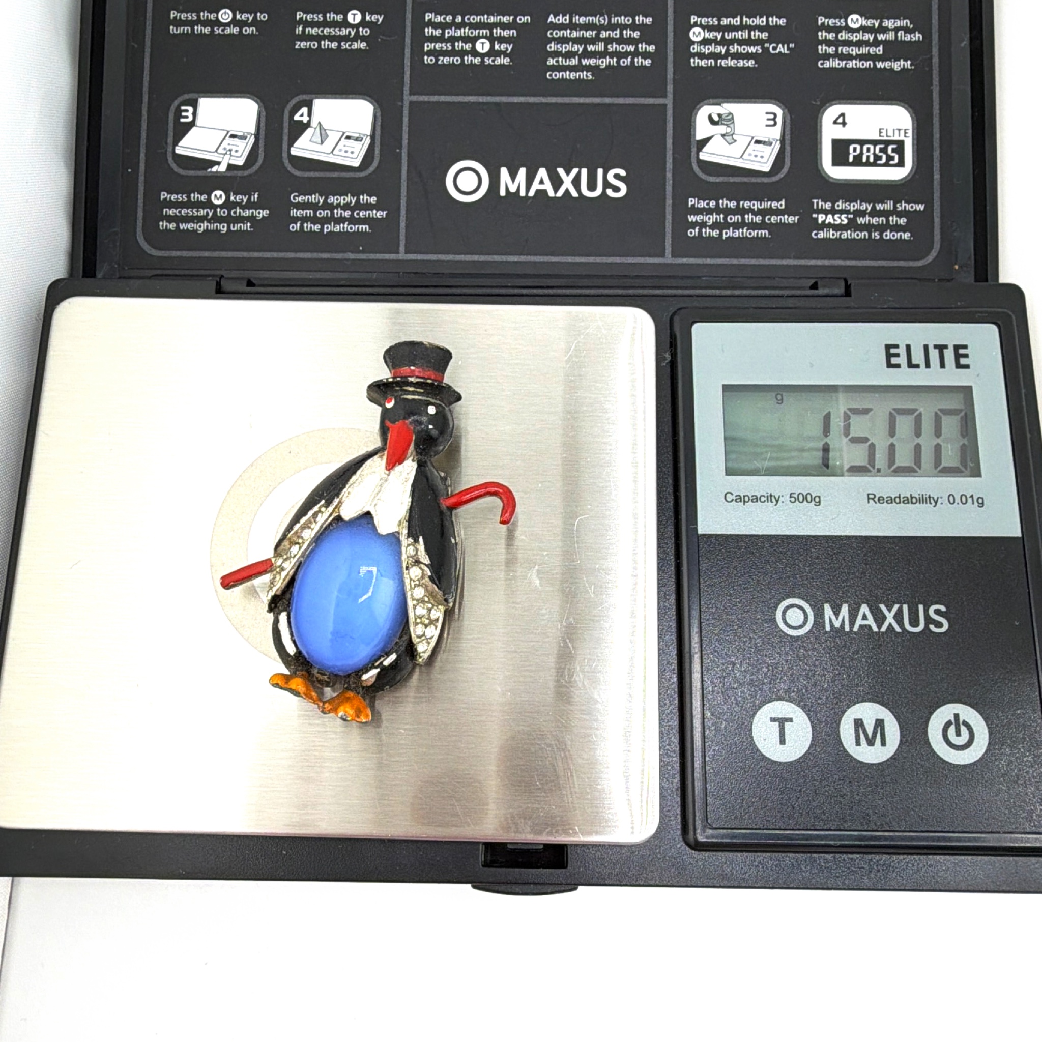 Art Deco 30s–40s Coro Mr. Penguin Fur Clip, Blue Glass Belly 15.00g — For scale