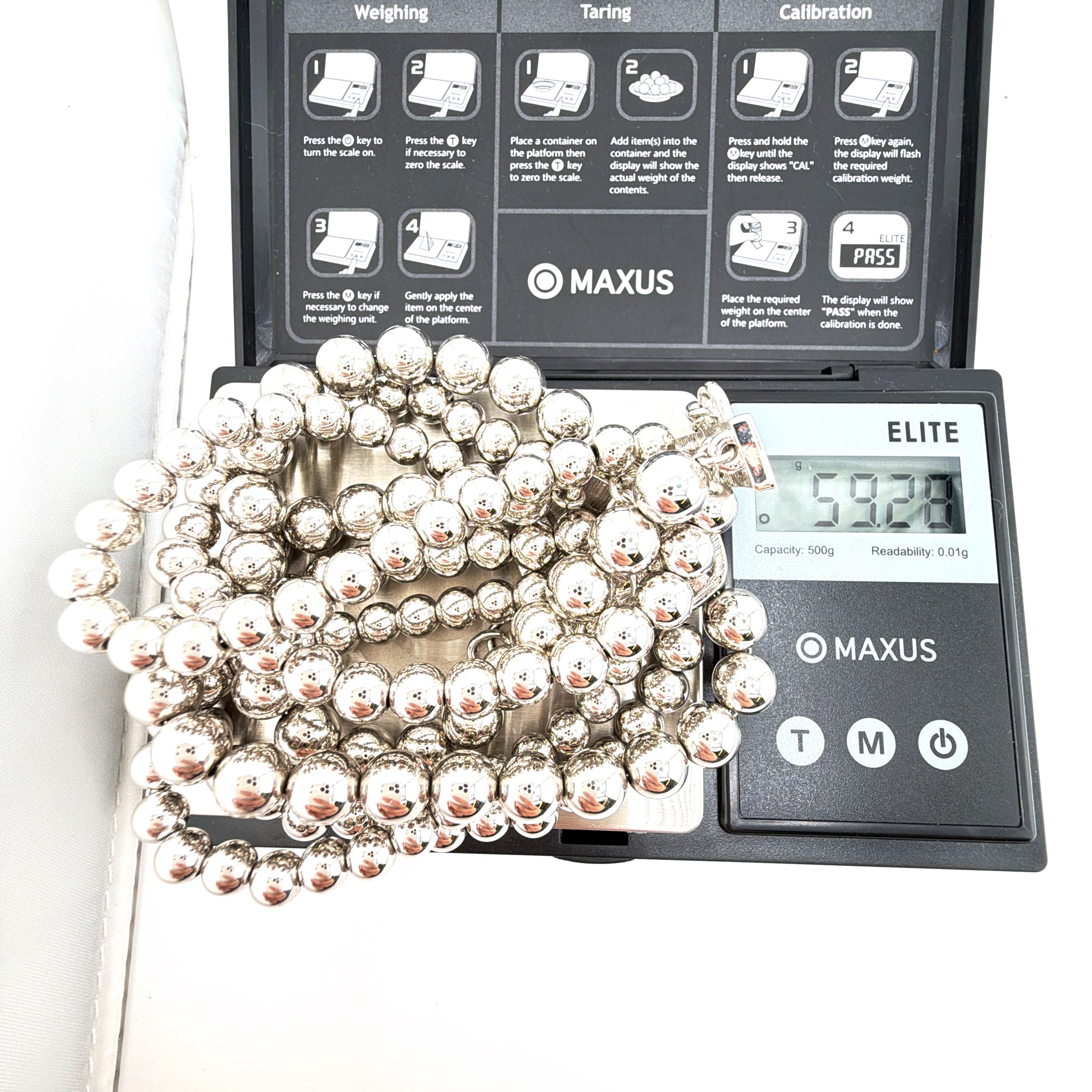 80s–90s Monet Silver Tone Graduated Bead Statement Necklace 59.28g 23 in — For scale