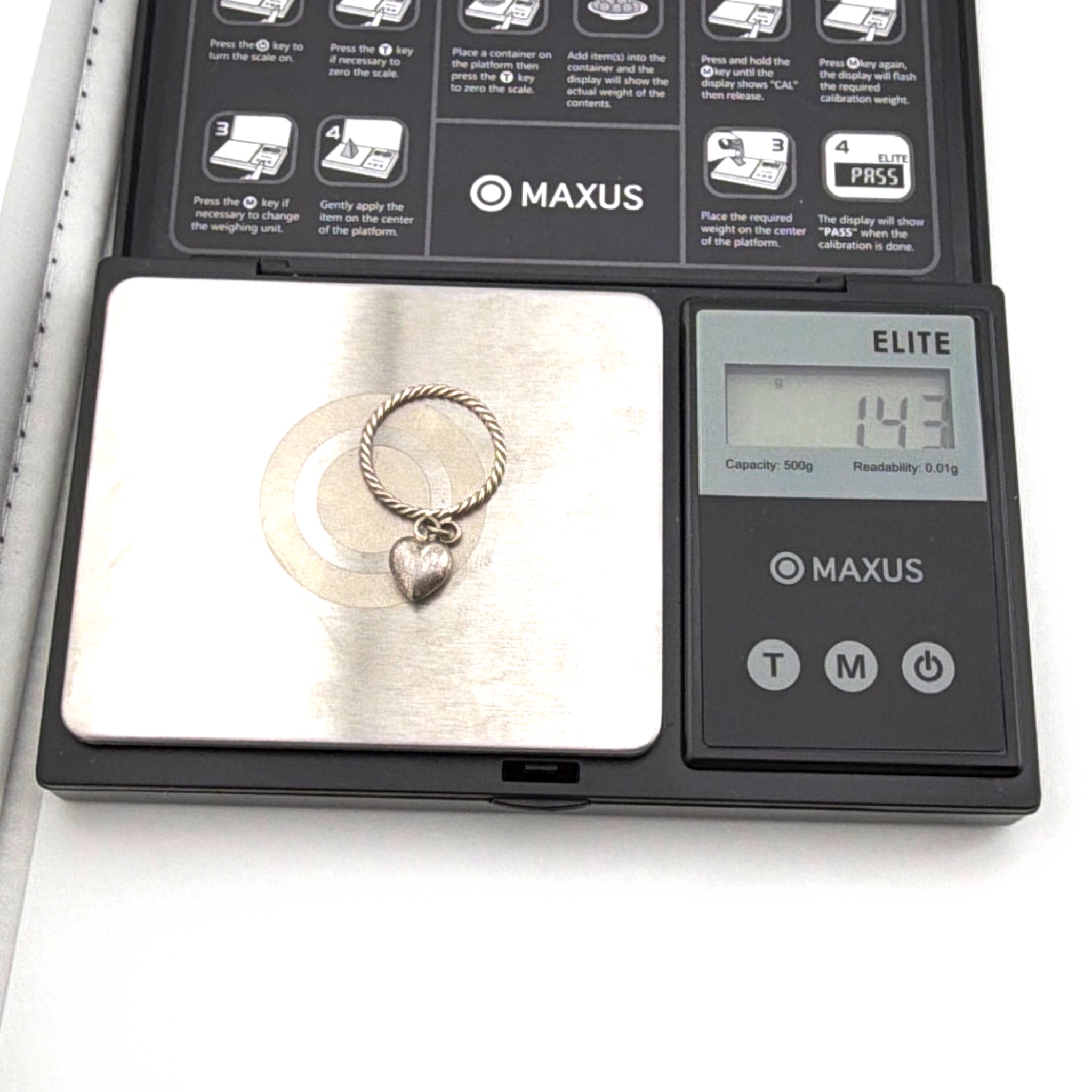 Silver Tone Twisted Wire Dangle Heart Ring 1.43g Size 6 — For scale